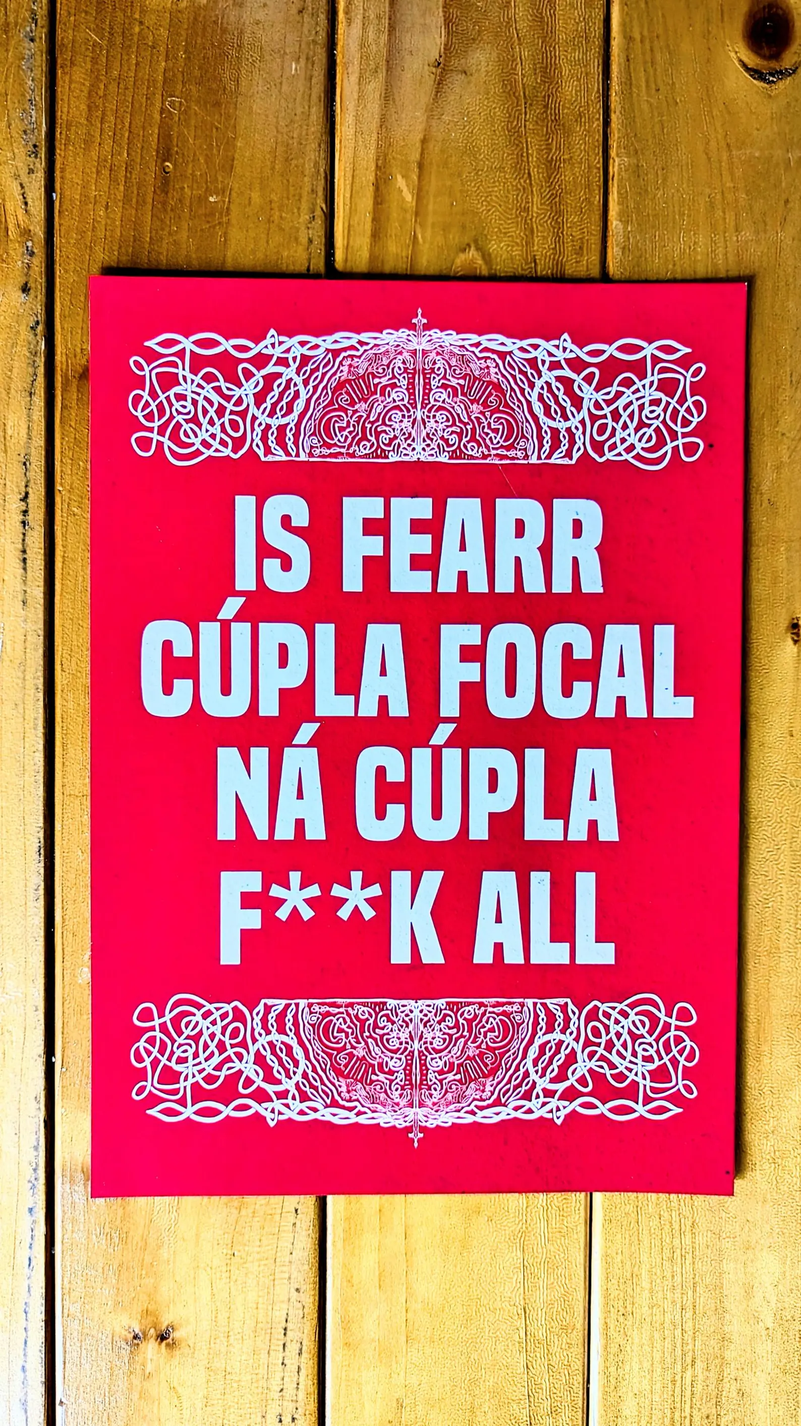 Funny Gaeilge art print Is Fearr Cúpla Focal by Tuathan